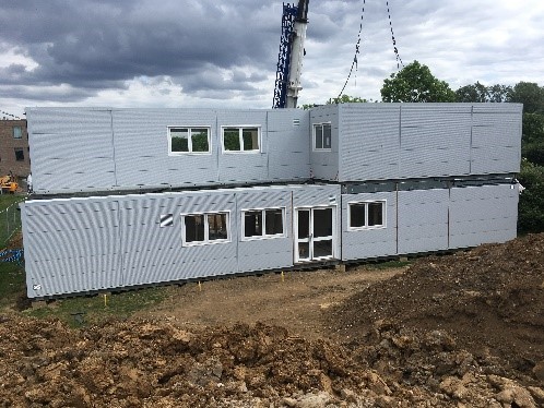 Reds10 install five modular school buildings
